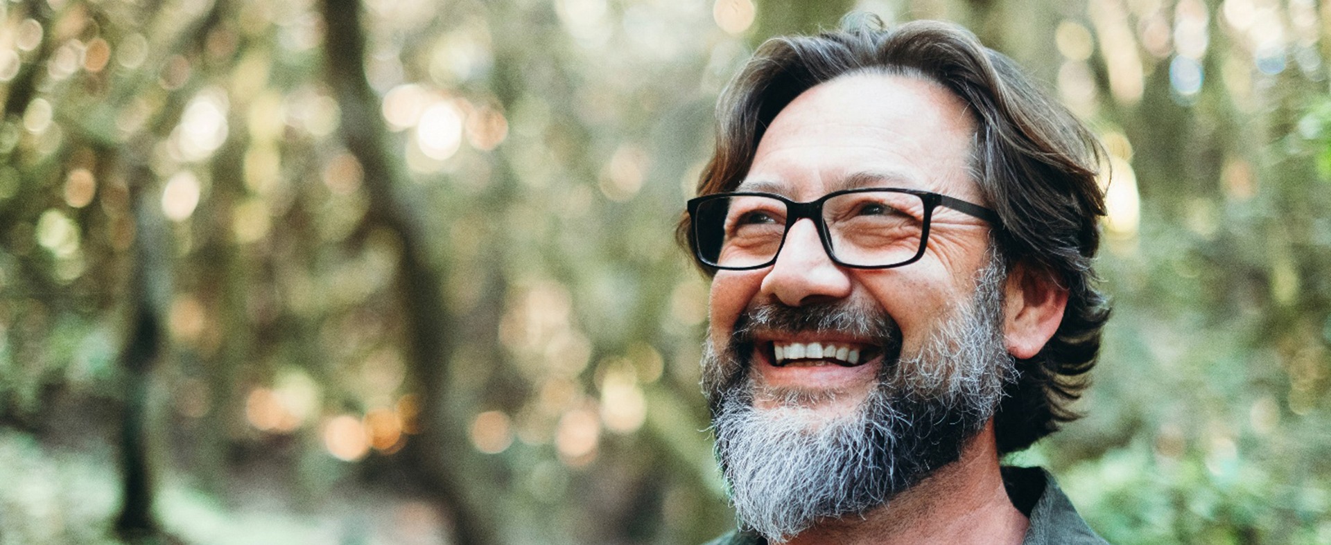 Man smiling outside