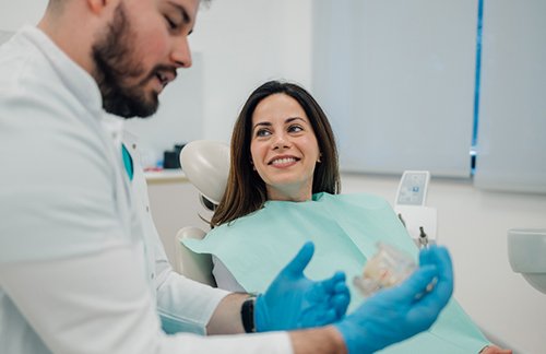 Woman smiling in the dental chair