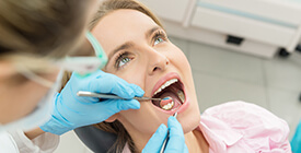 dentist placing filling