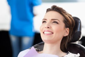 patient smiling in dental chair