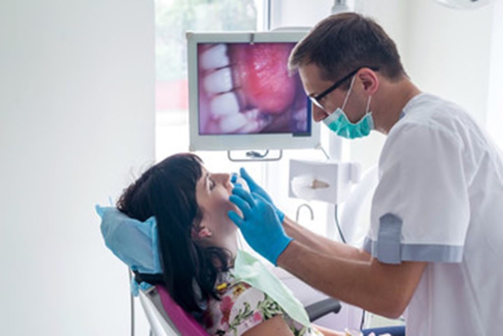 dental crown being placed 